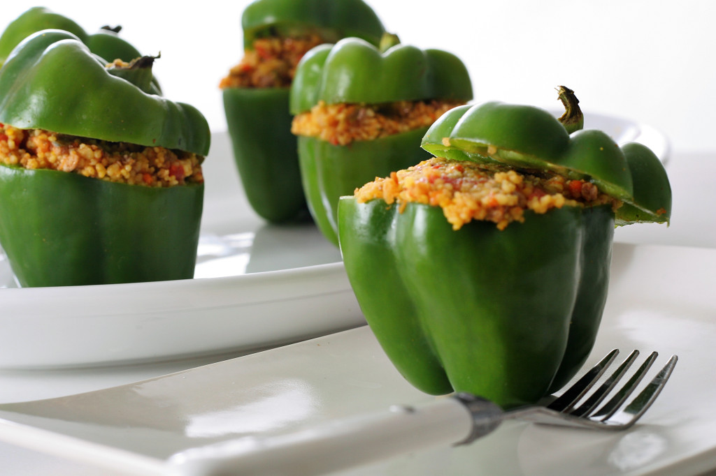 shot of stuffed peppers with roasted vegetable couscous